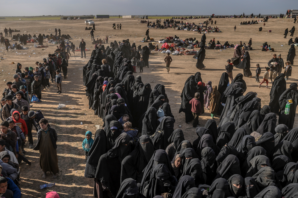 Civilians evacuated from the Islamic State (IS) groupu00e2u20acu2122s embattled holdout of Baghouz wait at a screening area held in the eastern Syrian province of Deir Ezzor, on March 5, 2019. u00e2u20acu201d AFP pic 
